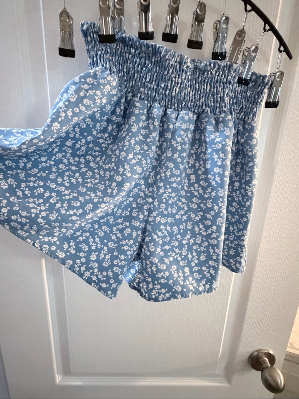 Blue and white floral smocked shorts